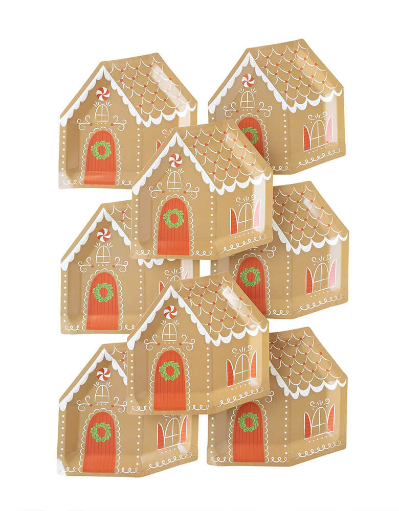 Momo Party's Gingerbread House Shaped Plates by My Mind'e Eye. Comes a set of 8 plates, featuring an adorable red door and frosted white accents, these dinner sized paper plates perfect for a jolly breakfast on Christmas morning, or kid's gingerbread house building party!
