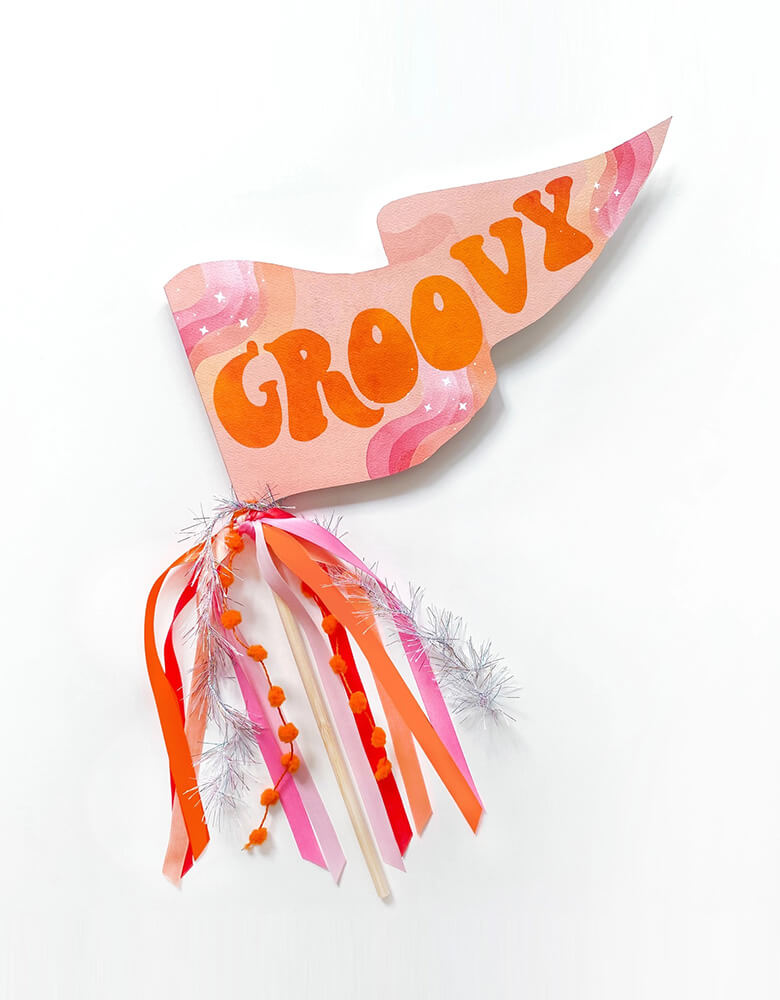 Momo Party's 10" x 5" Groovy party pennant by Cami Monet. The pink and orange groovy party pennant is perfect for disco bachelorette parties, 70s birthday party decor and more!