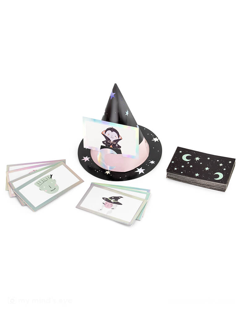 Momo Party's Halloween Guessing Game Set by Party Deco. This set includes 6 witch hats with elastic band and 40 cards with Halloween character illustrations including Halloween witches, Dracula, Frankenstein and more.