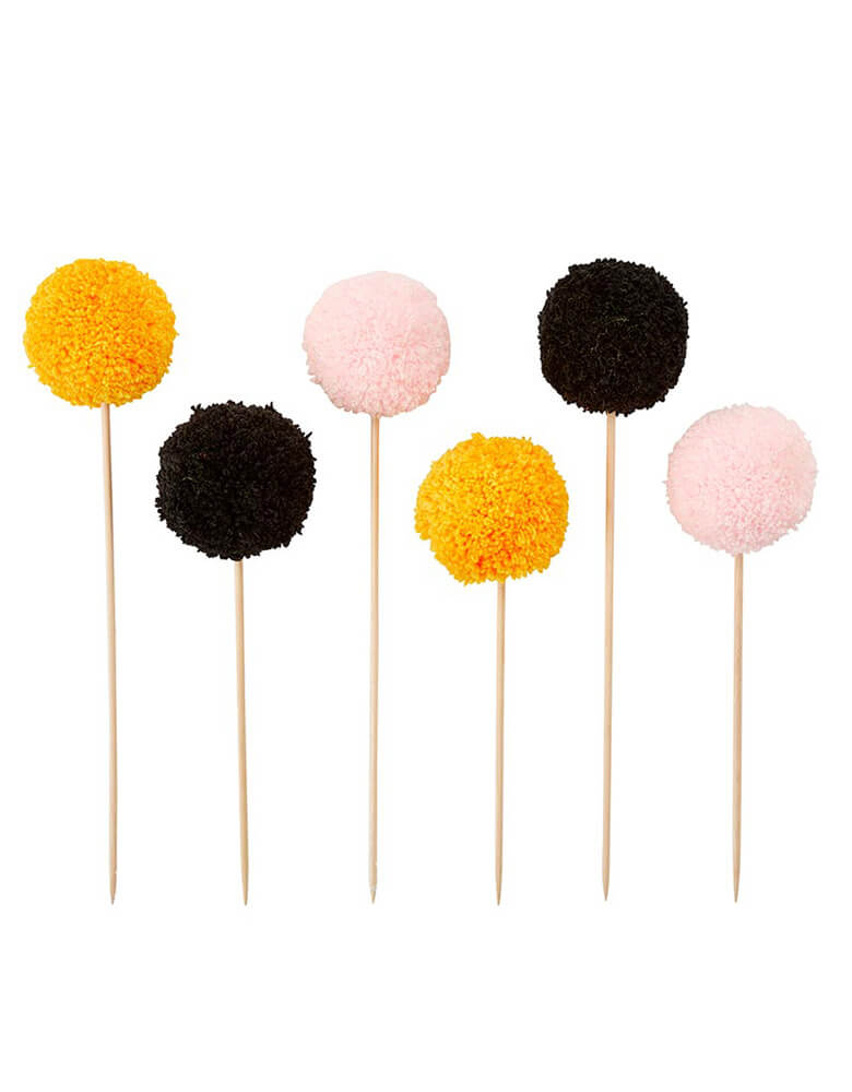 Momo Party's 7" Halloween pom pom cake toppers in orange, pink and black by Slant Collection. Comes in a set of 6 toppers, they are perfect for a pink Halloween themed celebrations - cakes, pastries, or other fun dessert items.