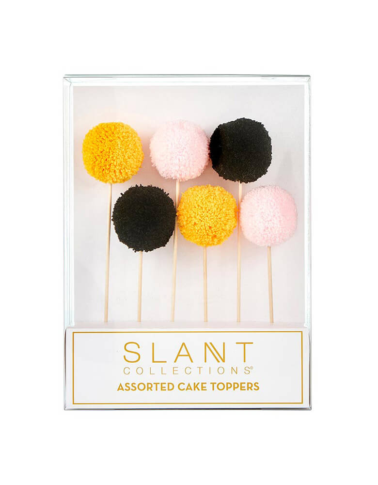 Momo Party's 7" Halloween pom pom cake toppers in orange, pink and black by Slant Collection. Comes in a set of 6 toppers, they are perfect for a pink Halloween themed celebrations - cakes, pastries, or other fun dessert items.