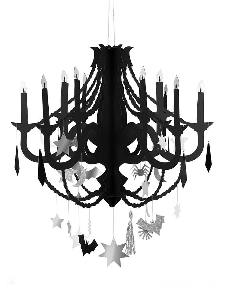 Momo Party's 18.5" x 14.75" x 18.5" Black hanging paper chandelier by Meri Meri. This thrilling paper chandelier makes a statement Halloween party centerpiece. Crafted from high quality heavy weight black card 32 Hanging decorations - 1 silver metallic thread tassel, 19 silver Eco glitter and foil decorations, 6 black decorations, 6 white decorations - all with wire pre-attached. Each set comes with a shiny silver foil details Silver metallic cord to hang it up for your spooky Halloween bash!
