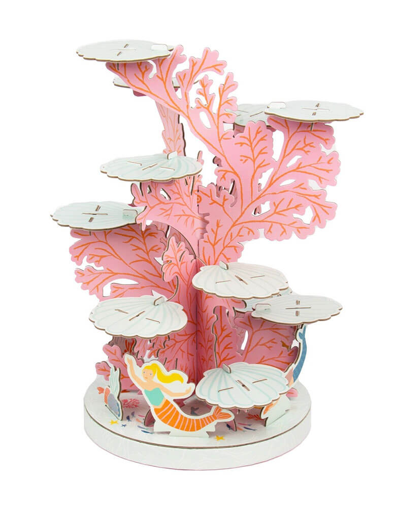 Momo Party's 1.4″ x 10.5″ x 15″ Mermaid Coral Cupcake Stand by Talking Tables. This show stopping coral reef mermaid cake stand will be the talk of the party. Featuring mermaids swimming around a colorful coral reef, use the 12 platforms to hold cupcakes, donuts or other sweet treats. It's perfect for kid's under the sea / mermaid birthday parties.