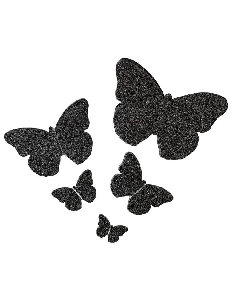 Momo Party's Mystical Bag of Butterflies Wall Decor. Comes in a set of 50 black glittered butterflies with sizes of  10 - 12", 10 -9", 10 - 6", 10 - 4" and 10 - 2.5" . These double-sided butterfly decorations are perfect to create a spooky vibe to your home!