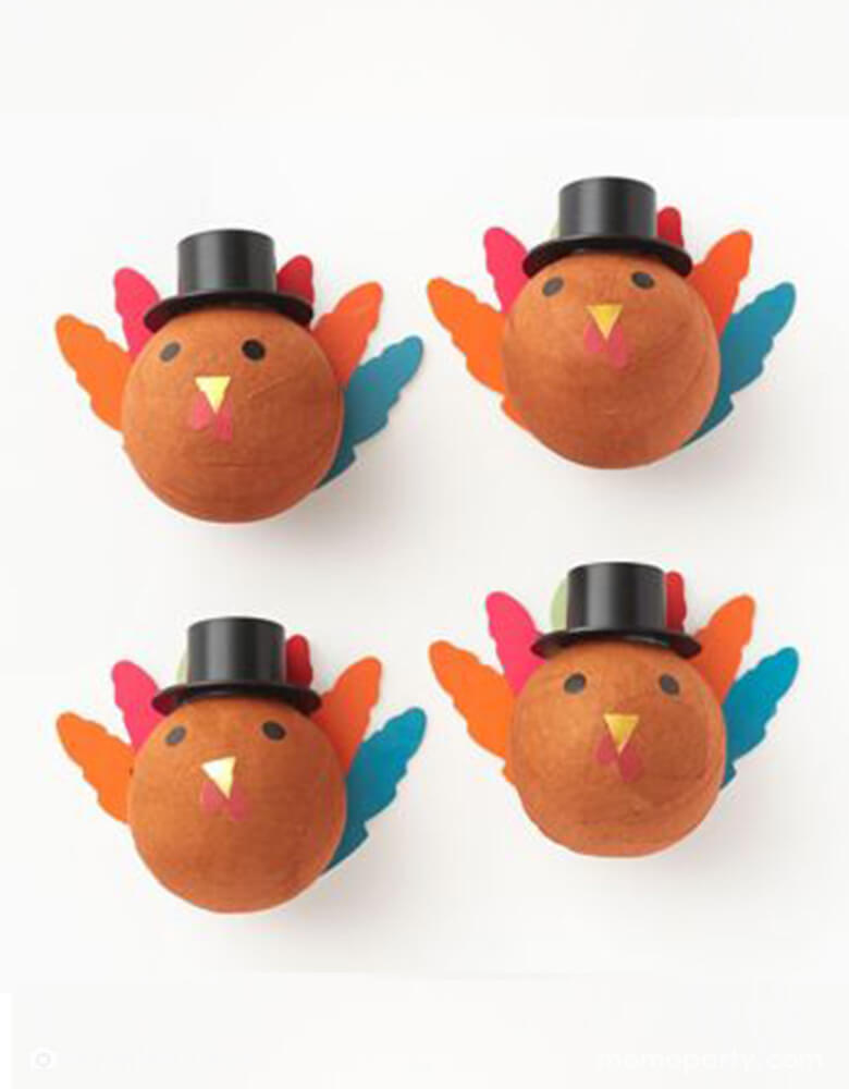 Momo Party's turkey surprise balls by Paper Source.Celebrate the season with these festive and adorable turkey surprise balls, sure to inspire smiles and great fun around the thanksgiving table. Each surprise ball contains a turkey tattoo, resin toy and pumpkin sticker.