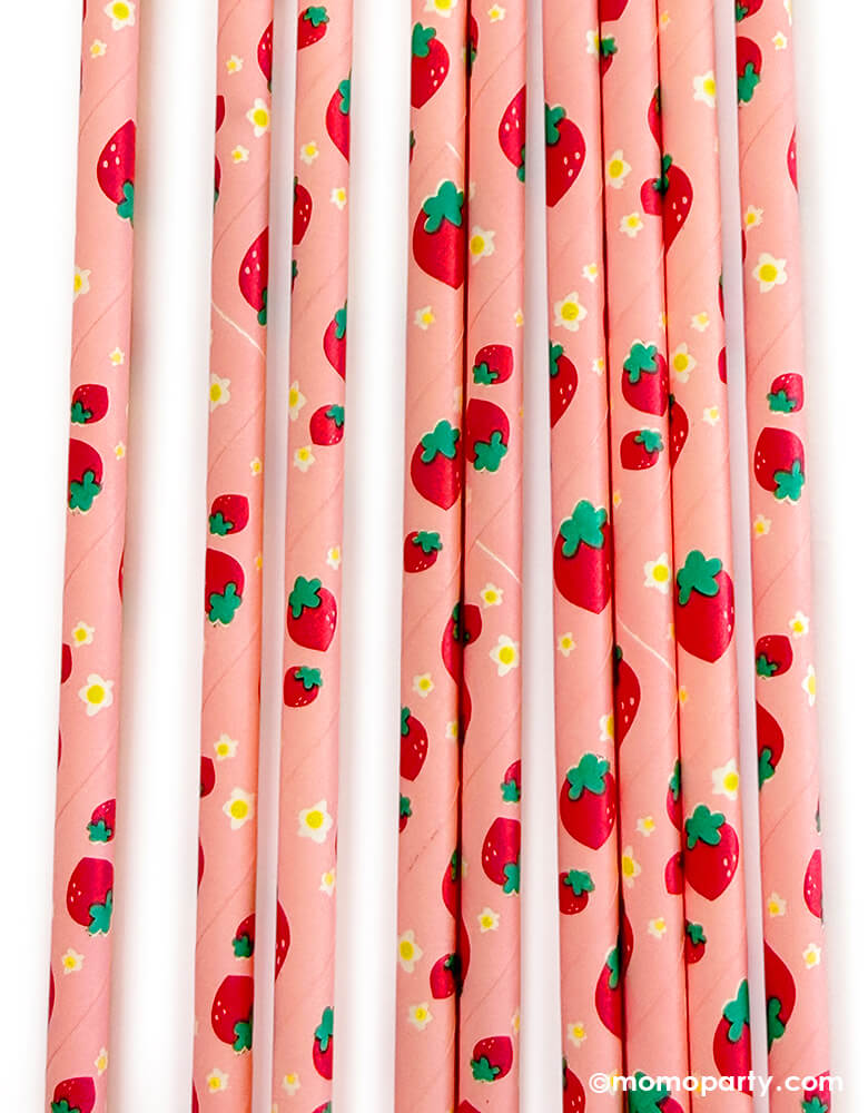 Details of momo Party's eco friendly disposable paper party straws with Strawberries and yellow flowers pattern on a white background.