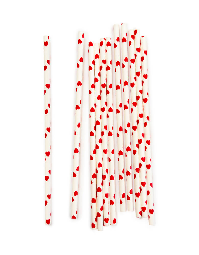 Momo Party's eco friendly disposable paper party straws with red hearts pattern on a white background.