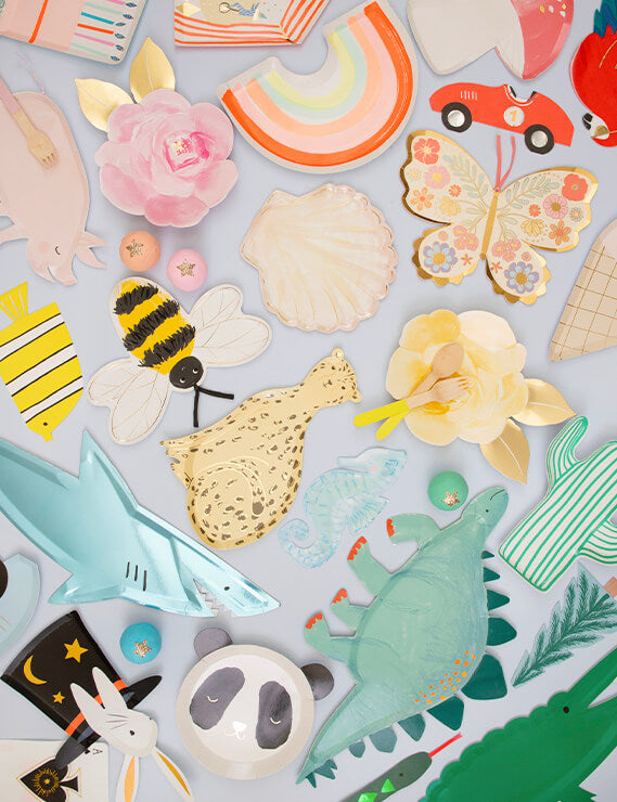Table fill with Meri Meri Fun die cup party plates of Dinosaur, Cheetah, Shell, Bee Flowers, Butterflies, Cactus, and Napkins, sale by Momo Party online boutique store 
