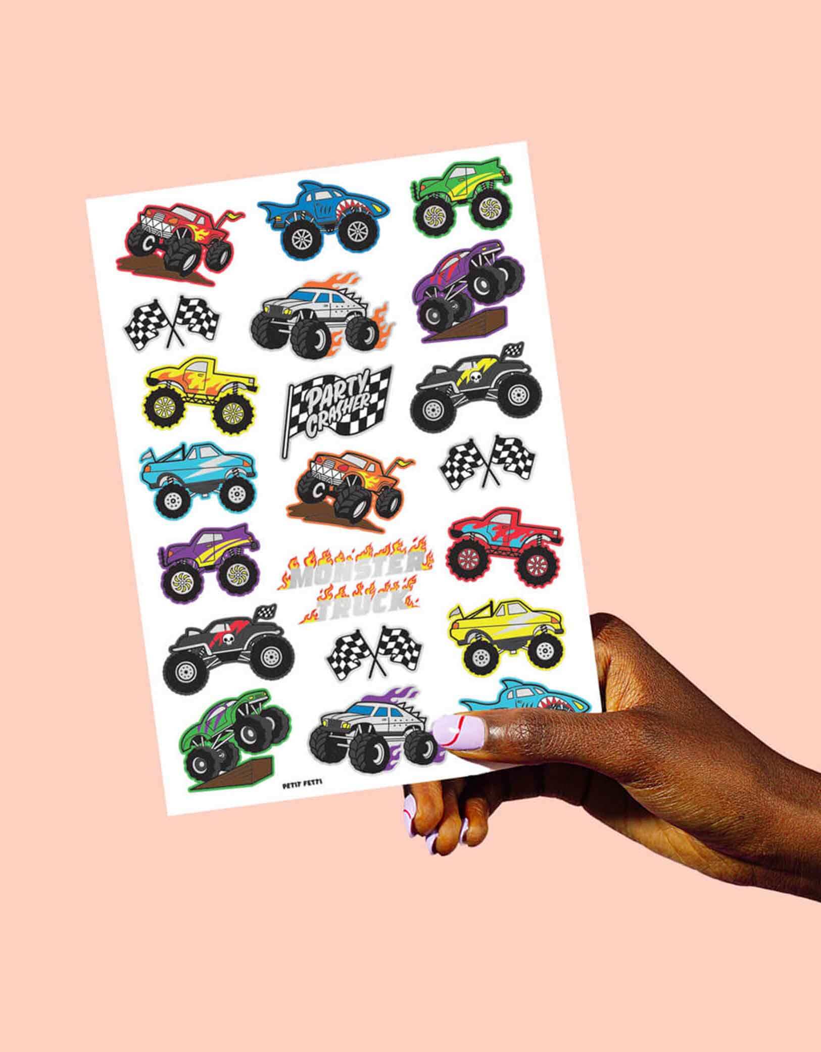 Momo Party's Monster Truck Kids Temporary Tattoos by Xo, Fetti. Comes in a set of 42 silver foiled colorful tattoos, these temporary tattoos are perfect for your kid's monster truck themed birthday party.  Rev your engines, shift your gears, these Monster Truck temporary tattoos are guaranteed to be a wheel good time! 42 designs including various monster trucks, race car flags, and fire flames, invite all of your bffs to crash this monster truck party because these tats are sure to be fire!