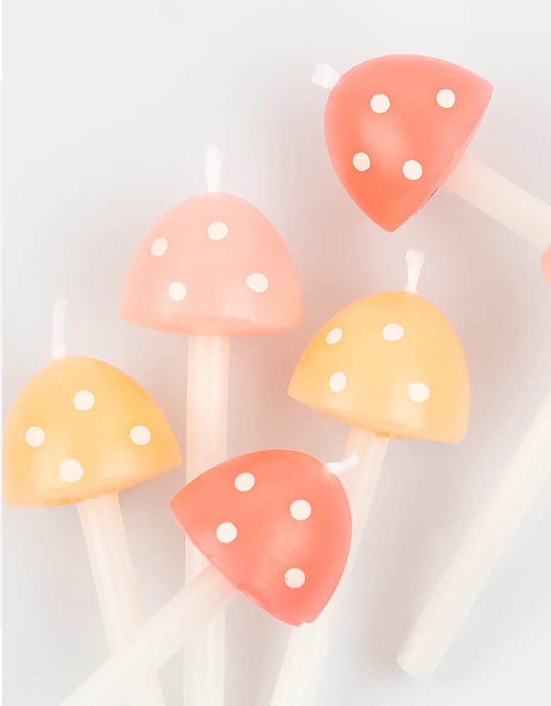 Momo Party's 3d mushroom birthday candles by Meri Meri. These mushroom candles are perfect for a fairy, outdoor adventure, garden or autumnal party. Crafted in soft pastel shades, with two sizes to give a layered effect, they will instantly make any cake a show-stopper.