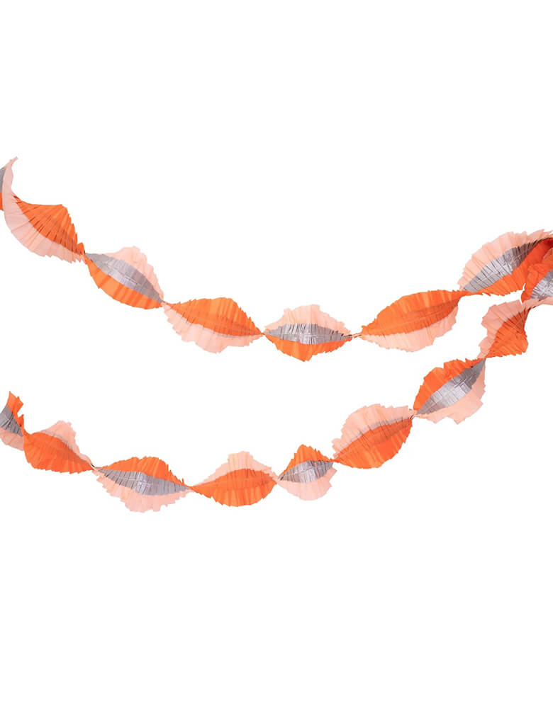 Momo Party's 10' orange, pink and silver stitched streamer by Meri Meri. With a stunning trio of orange, shiny silver and peach, it's a perfect decoration for your sweet pink Halloween celebration!