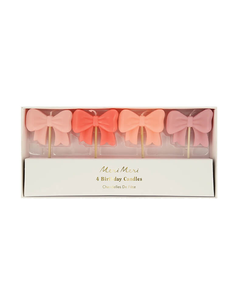 Momo Party's 1.35" pink bow candles by Meri Meri. These adorable candles, in different shades of pink, are on-trend for Valentine's Day or a girl's birthday party