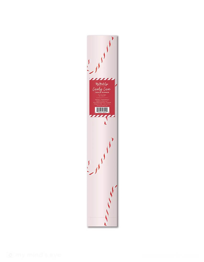 Momo Party's 16 x 120 inches pink candy cane paper table runner by My Mind's Eye. Featuring a festive candy cane pattern on a light pink background, this table runner creates a modern merry scene at your table this Christmas!