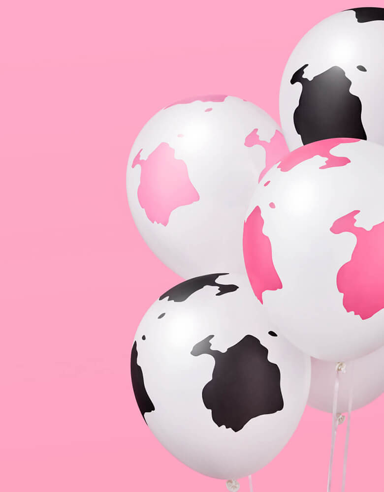 Momo Party's Pink Cow Print Latex Balloon Mix by Xo, fetti.  Comes in 24 matte cow print latex balloons, including 8 light pink, 8 hot pink and 8 black balloons, these latex balloons are perfect for girl's farm, barnhouse, rodeo, Western themed birthday party or a disco cowgirl bachelorette party.