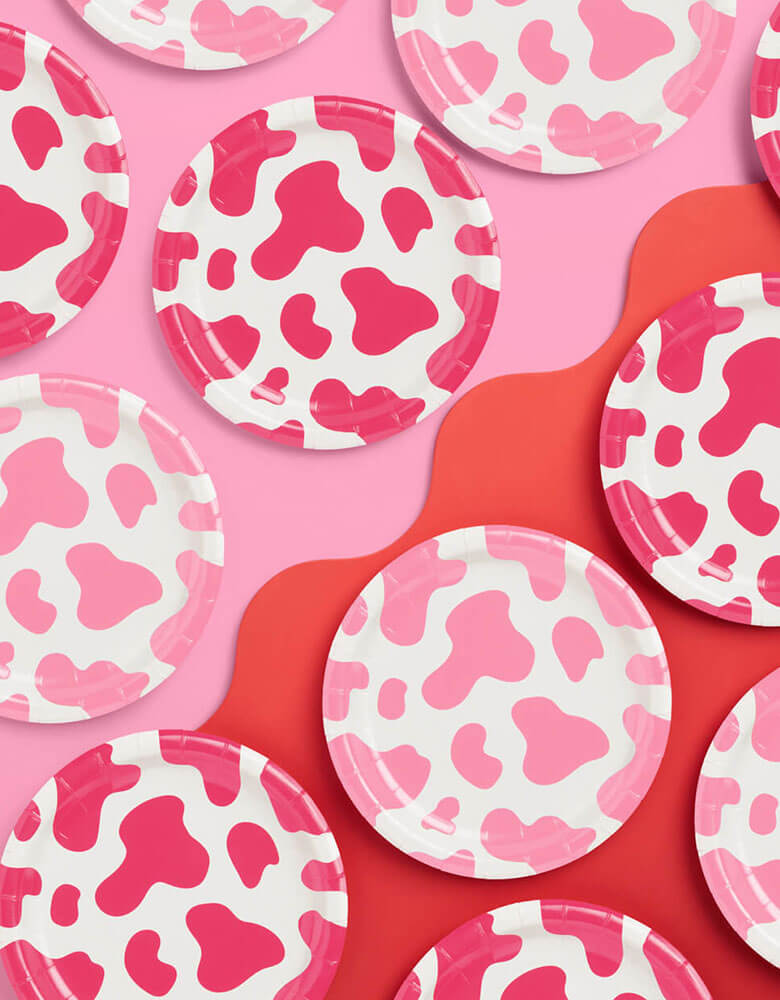 Momo Party's 9" Pink Cow Paper Plates by Xo, fetti. Comes as 24 plates a set in 2 shades of pink, these pink cow print paper plates are perfect for a disco cowgirl themed bash or girl's rodeo Western themed birthday party!