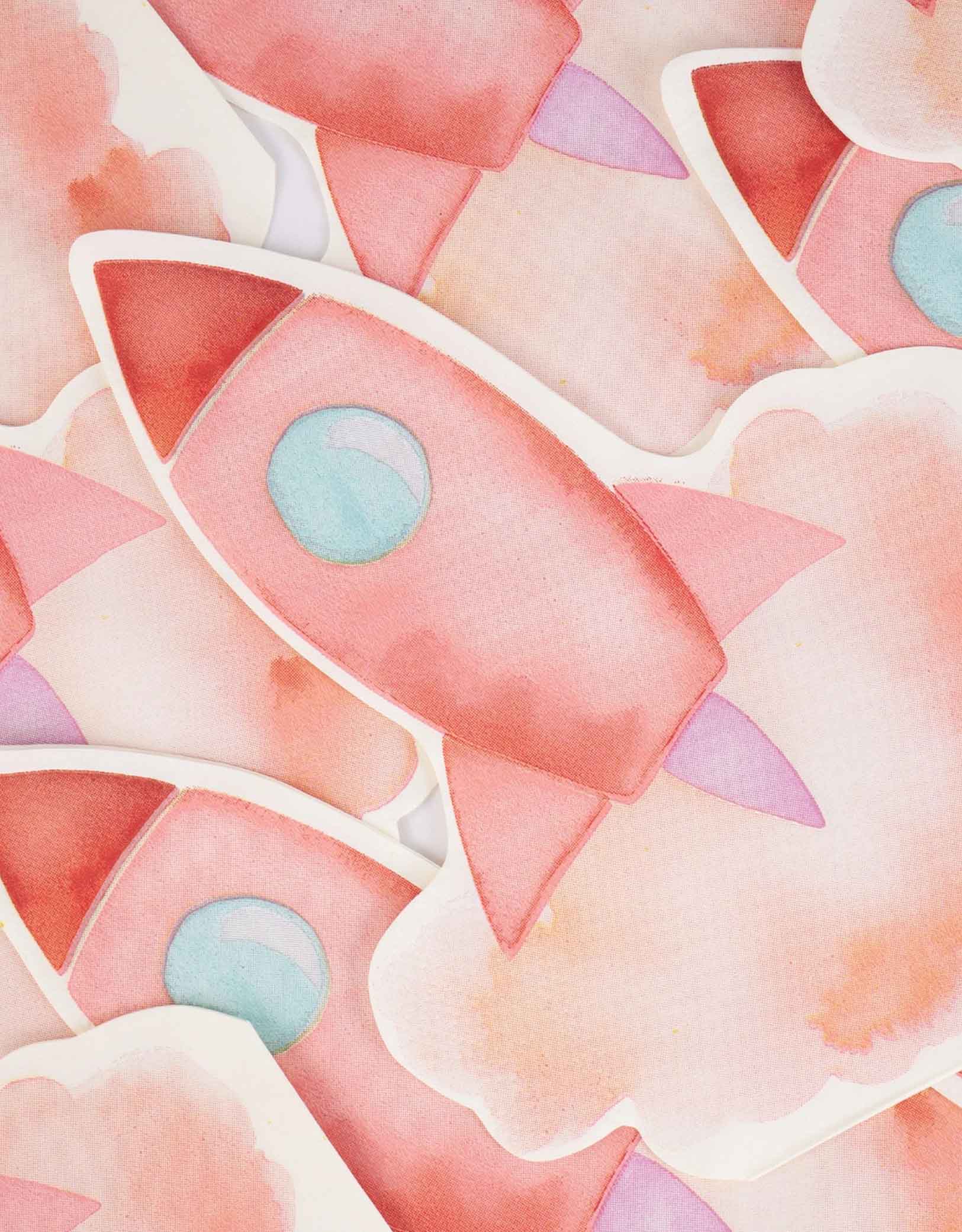 Momo Party's 8" x 6" Pink Rocket Ship Napkins in watercolor design.