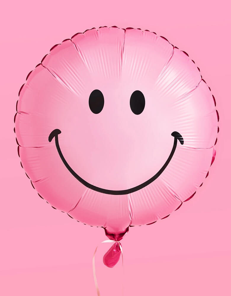 Momo Party's 18" pink smiley foil balloons by Xo, Fetti. Comes in a set of 2, these happy balloons make for the perfect accessory to your celebration. Smile big with these matte happy face foil balloons and keep the whole party happy all night long.