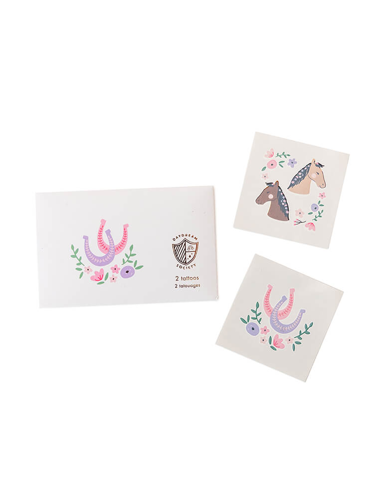 Momo Party's Pony Tales Temporary Tattoos by Daydream Society. These temporary tattoos feature designs of ponies and horseshoes adorned with florals. They make perfect non-sugar party favors at your little girl's pony, cowgirl or rodeo themed party!
