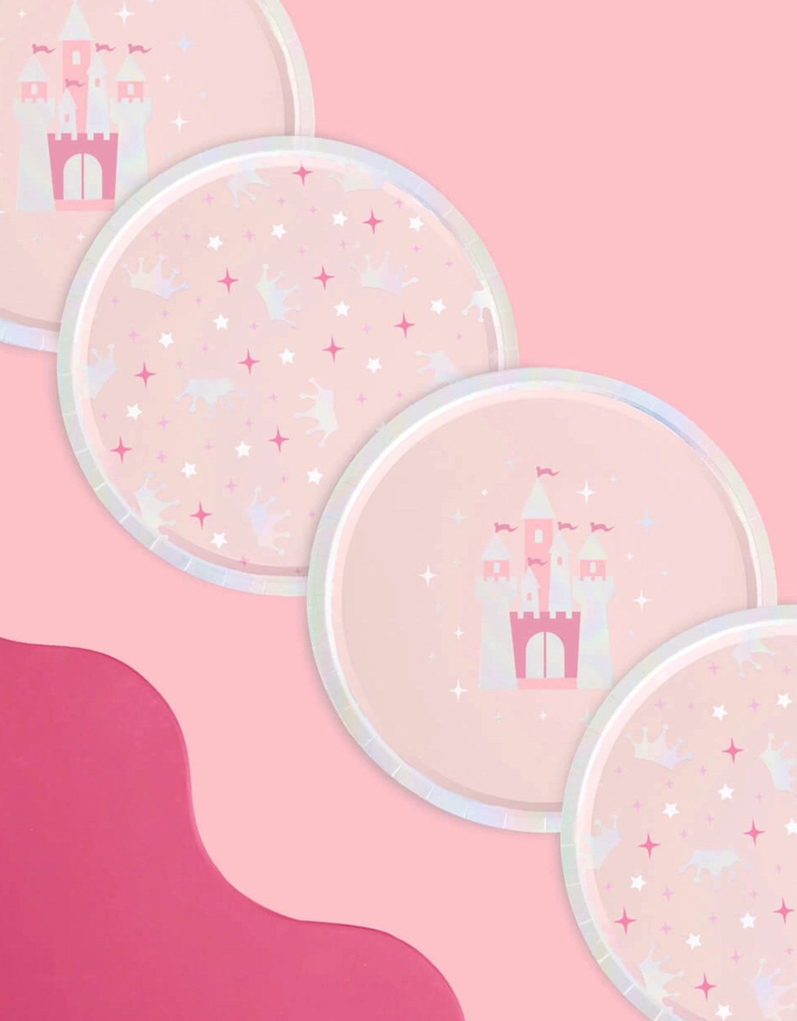 Momo Party's 9" princess iridescent round party plates in two designs each featuring a pink castle design and crowns and star point patterns on a pink background.