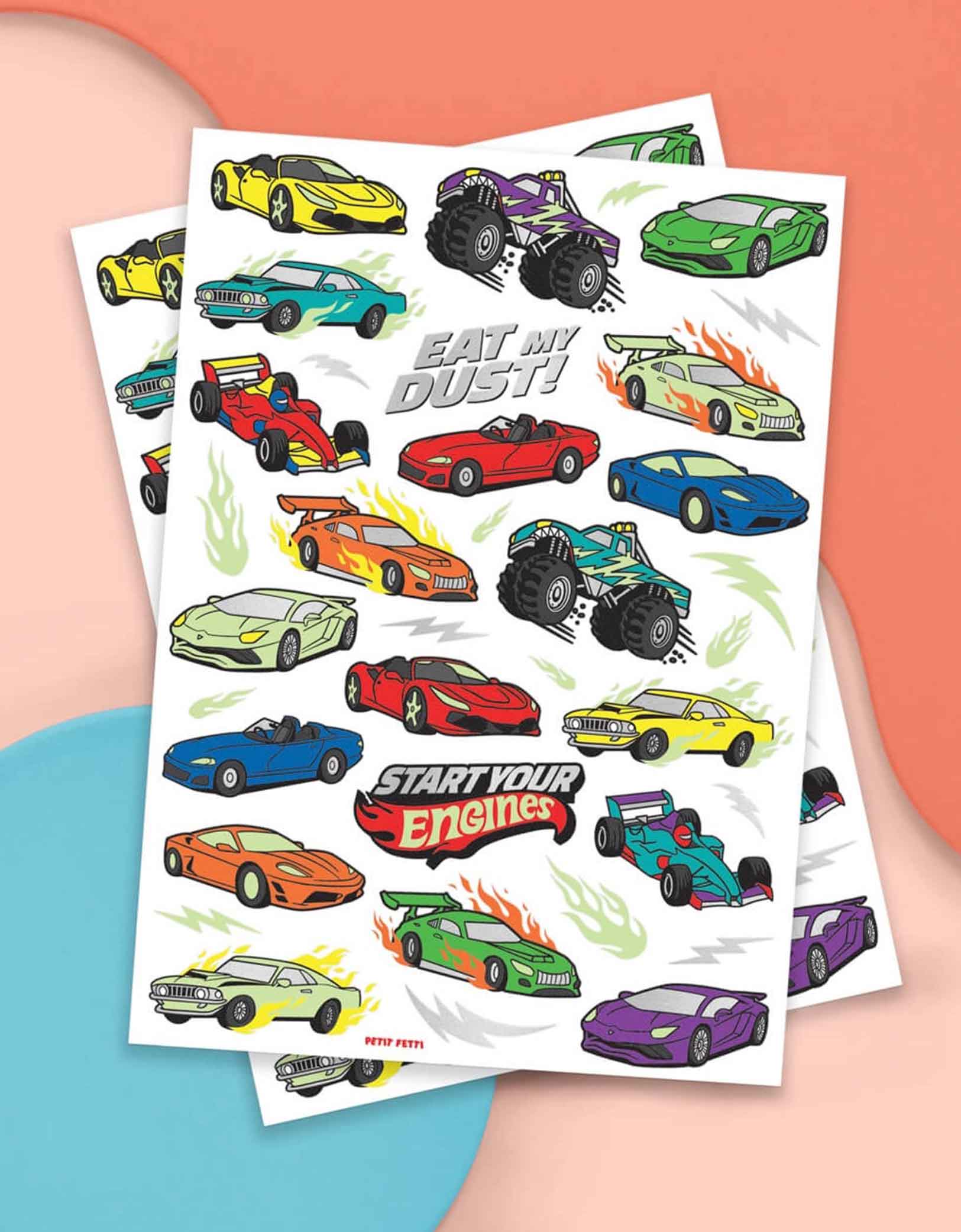 Two sheets of colorful race car themed temporary tattoos from Momo Party with text "Eat my dust" & "Start Your Engines" on a blue and pink background