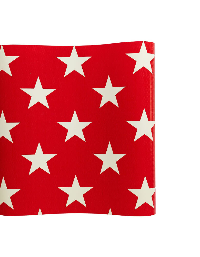 Momo Party's HAM922 - RED STAR TABLE RUNNER by My Mind's Eye. Designed with a festive star pattern on a red background, this table runner is the perfect way to create a patriotic table for your Fourth of July gatherings this summer!