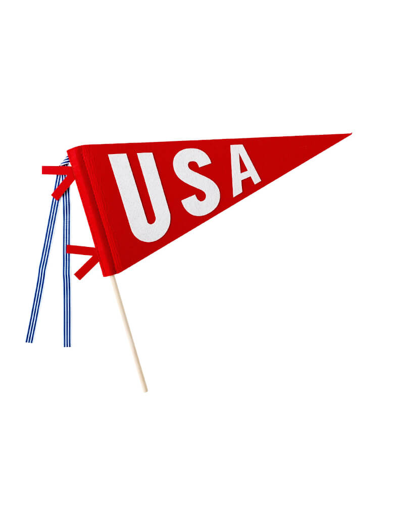 Momo Party's 15" red felt party pennant banner on a 14" wood stick by My Mind's Eye. Create a festive centerpiece for your summertime celebrations with this patriotic felt banner. Accented with striped ribbon, this felt banner gives any Memorial Day or Fourth of July picnic table a touch of vintage patriotic flair. And is a perfect way to keep the festive spirit all summer long by adding it to your tabletop decor in your home!