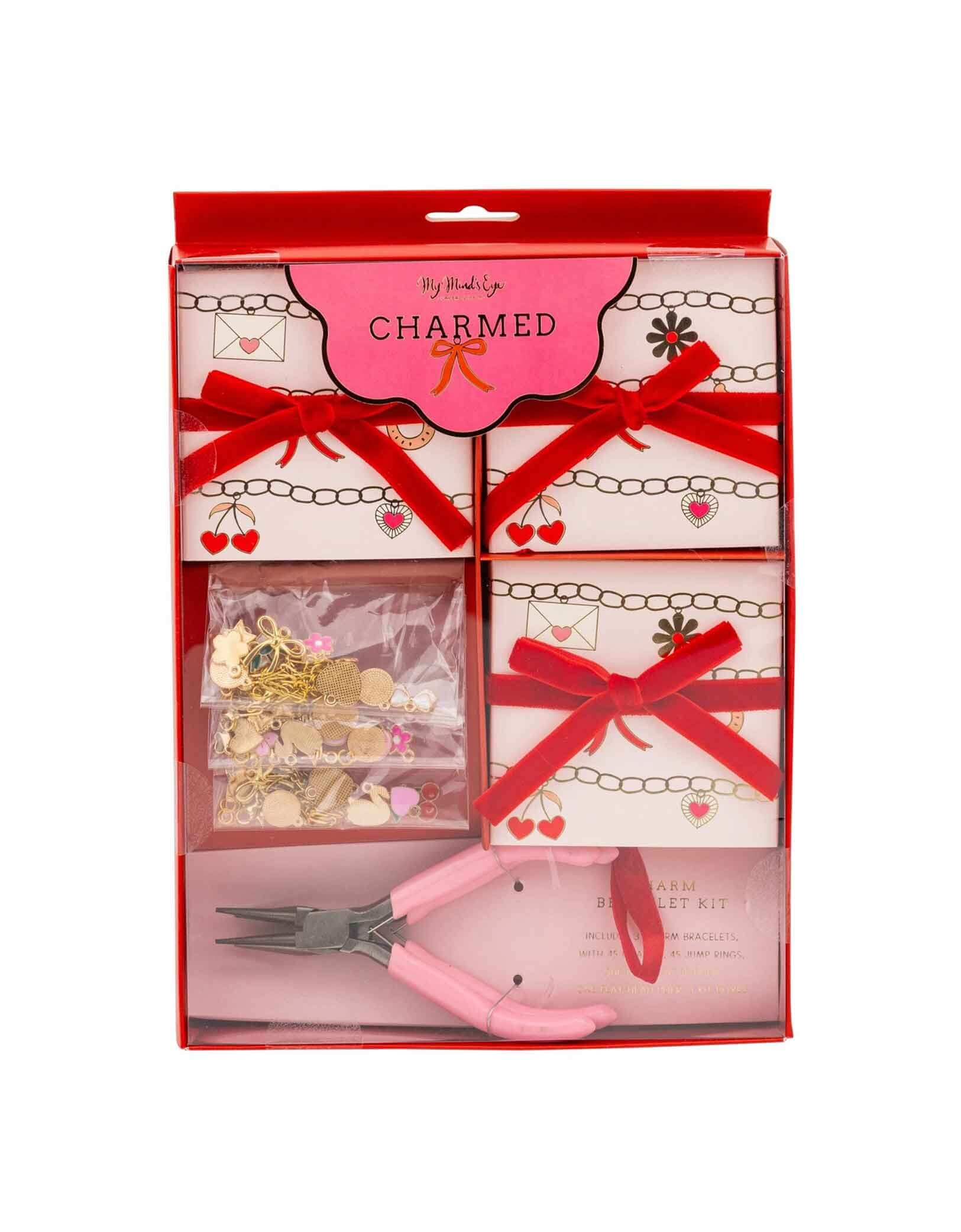 Momo Party's packaged Valentine's Day Charm Bracelet Kit with tools and materials, featuring three boxes with red bows in a white background.
