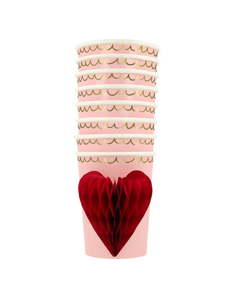 Momo Party's 9oz Honeycomb Heart Cups by Meri Meri. Comes in a set of 8 cups, featuring honeycomb red hearts, a pink background and swirled gold foil details to create a vintage look.