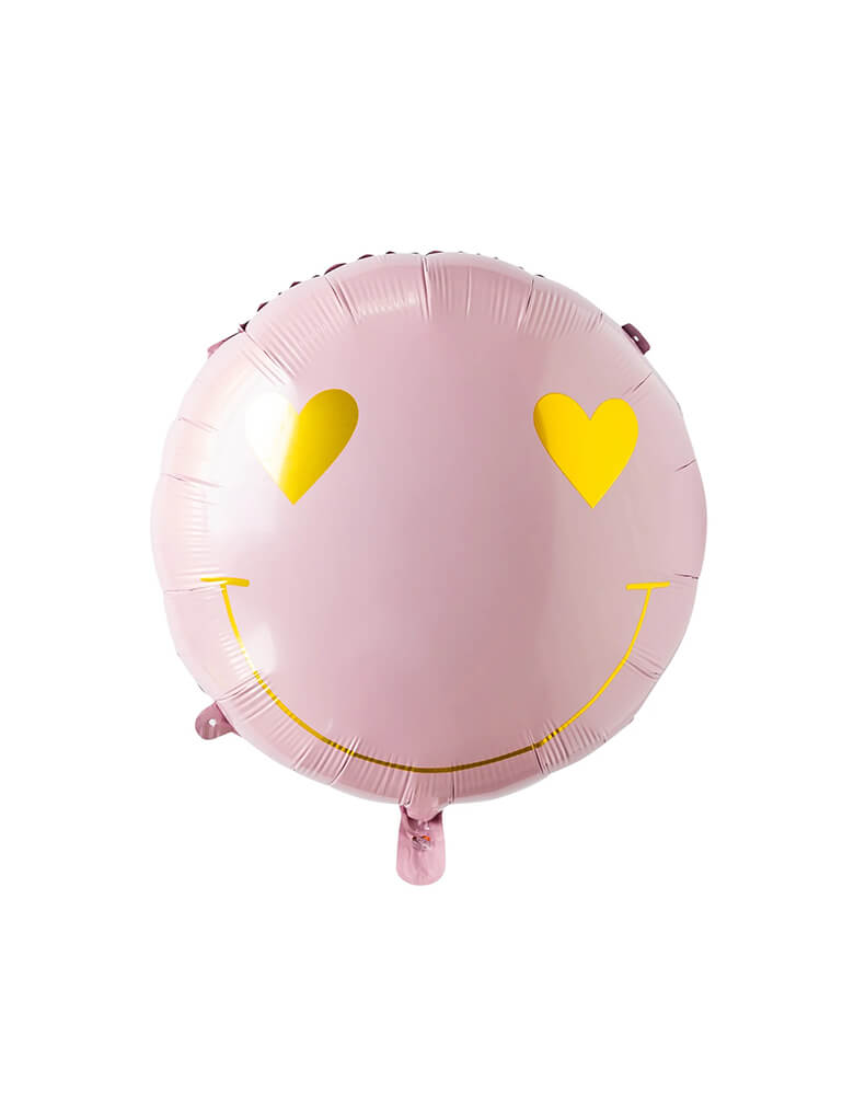 Momo Party's 24" Heart Eyes Love Foil Balloon by My Mind's Eye. In an adorable pink color with gold accent, this smiley face with heart eyes foil balloon is perfect for a kid's fun Valentine's Day celebration. So groovy!