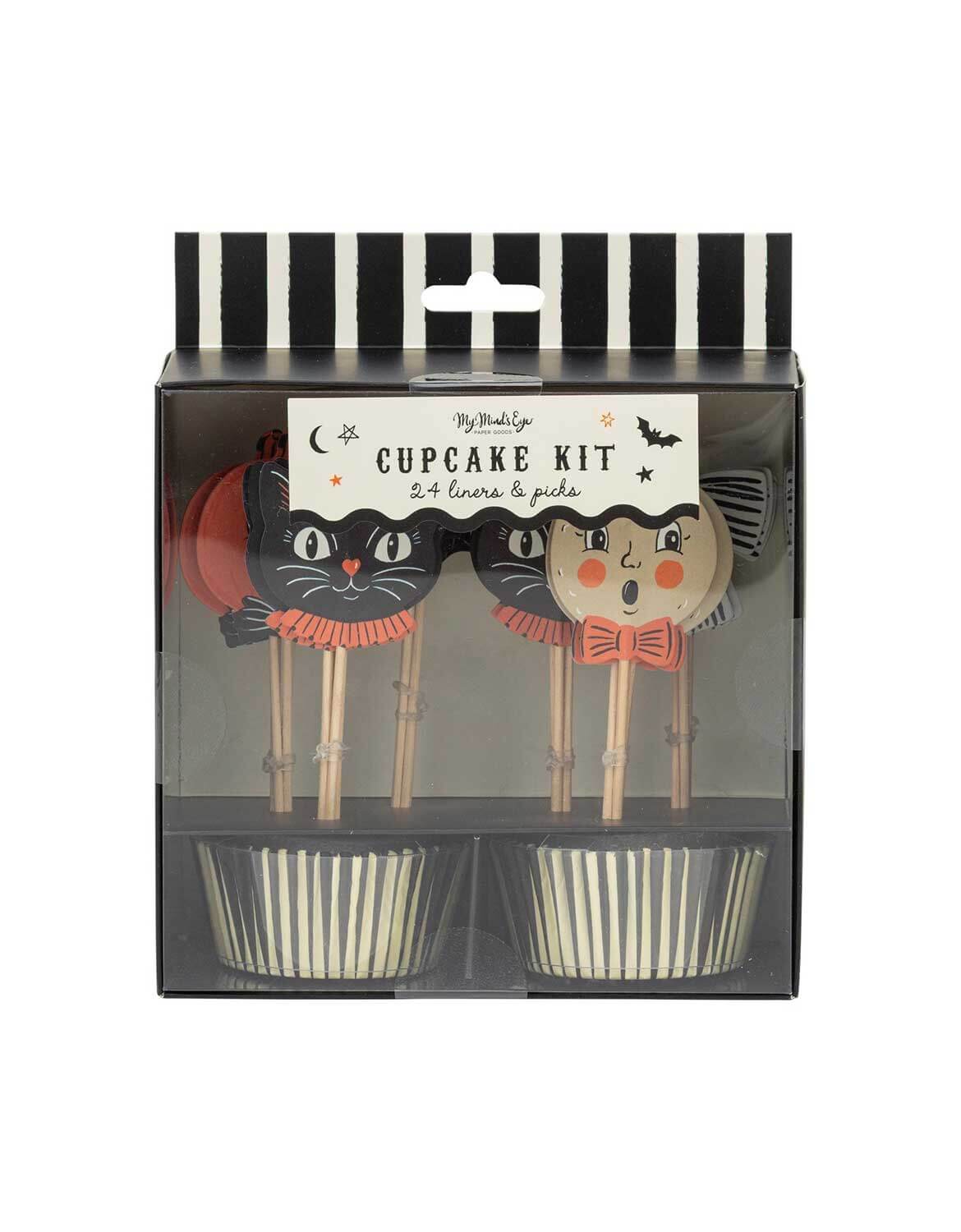 Momo Party's Halloween-themed cupcake kit by My Mind's Eye in its original retail packaging, featuring two decorated toppers with a black cat and a smiling pumpkin face, alongside black and white striped cupcake liners.
