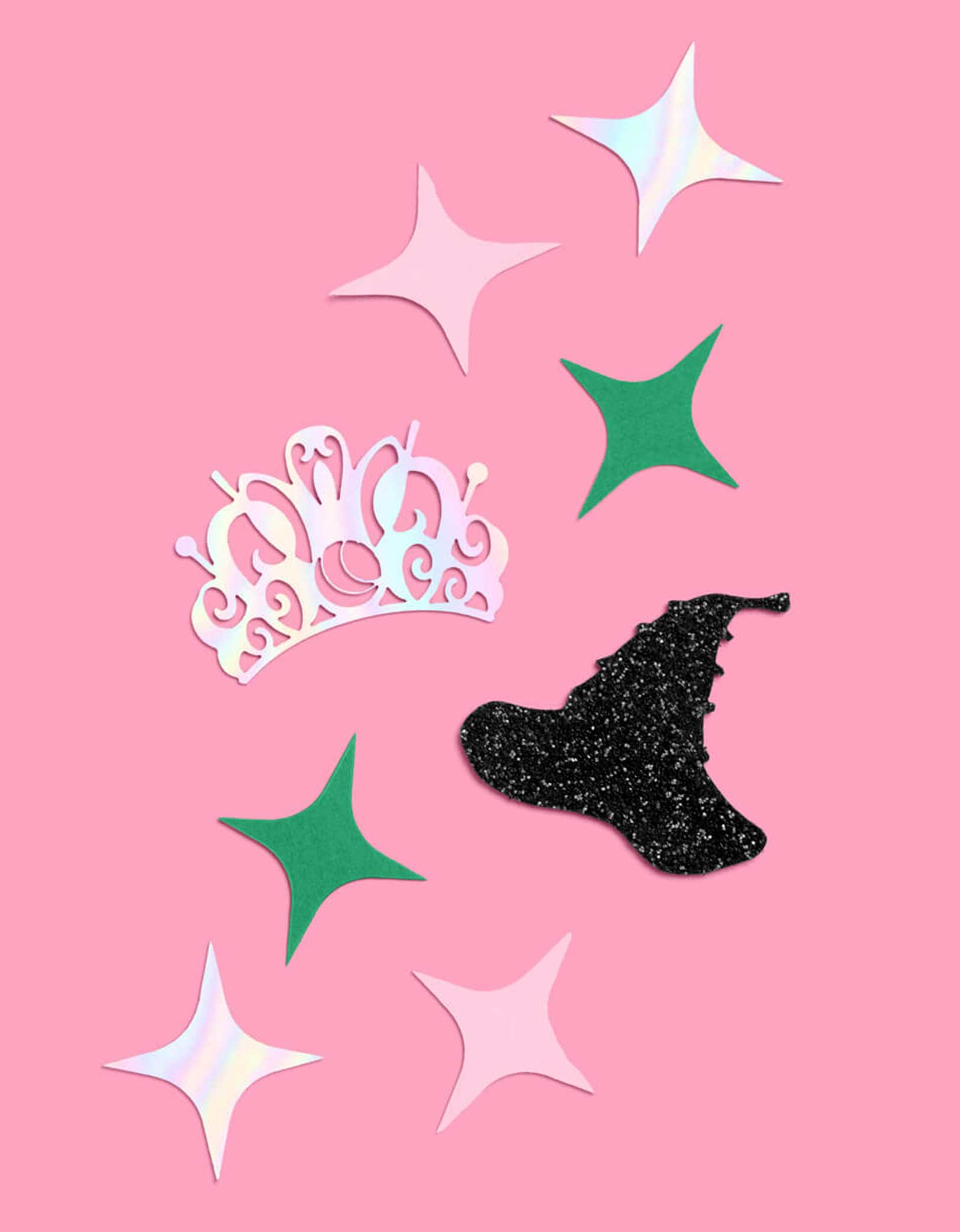 Momo Party's Wicked Witch Confetti featuring witch hats, tiaras, and stars on a pink background. This playful mix features tiny witch hats, sparkling tiaras, and bursts of pink and green confetti, perfect for casting a fun, wickedly charming spell over any party. Sprinkle it on tables or toss it in the air to enchant your guests with a festive, colorful vibe. Perfect for kid's Wicked birthday party, Halloween witch themed bash or a magical gathering.