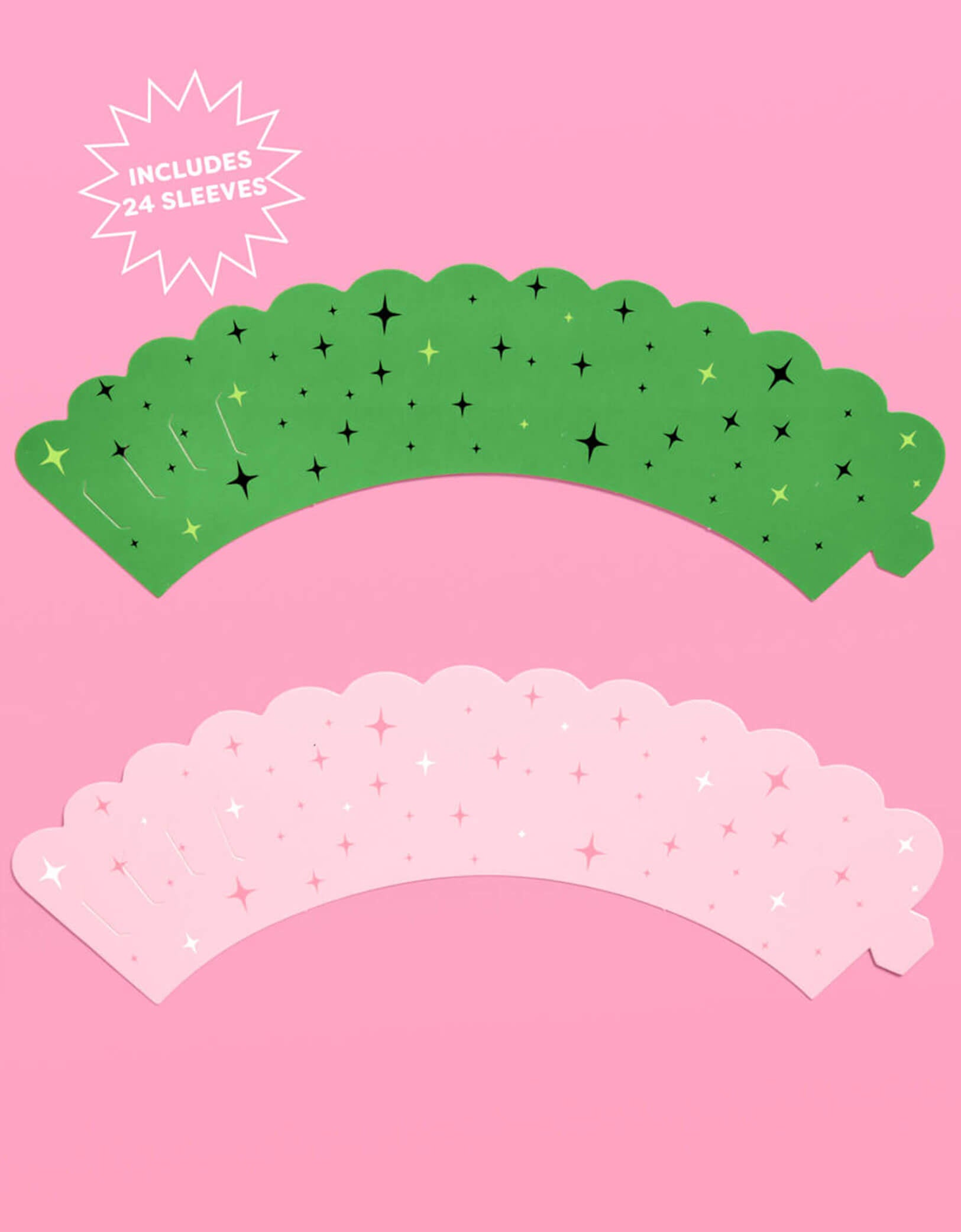 Momo Party's Wicked green and pink decorative cupcake sleeves with star point design on them on a pink background with text 'Includes 24 sleeves'.