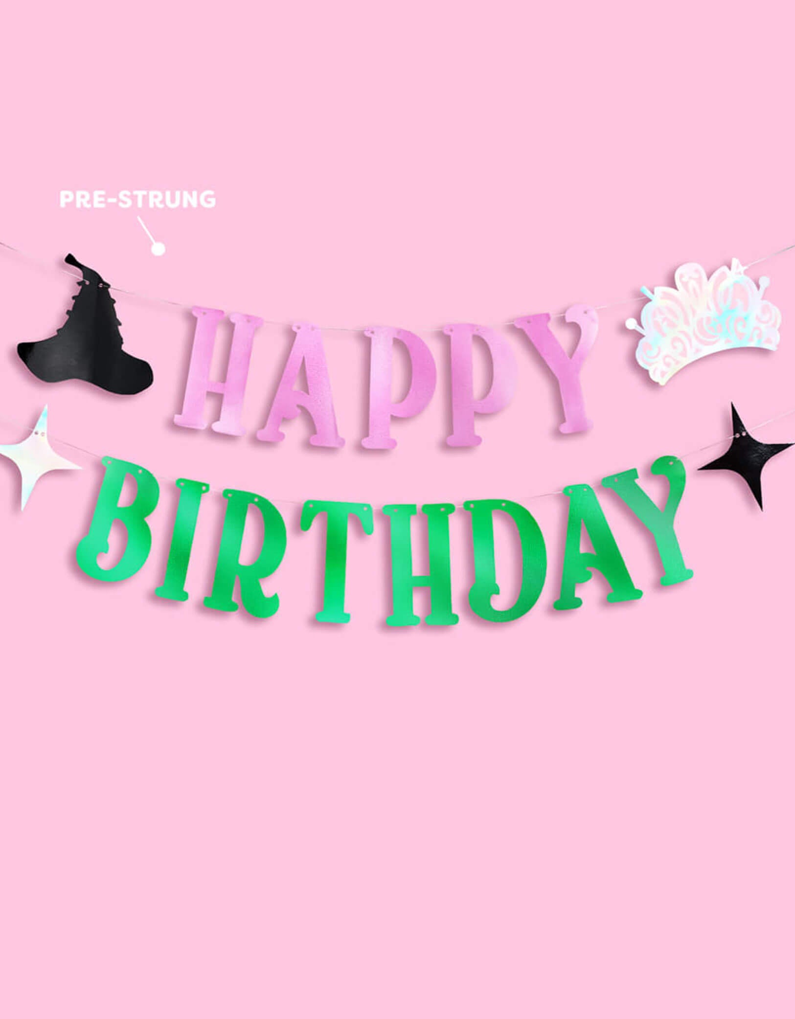 Momo Party's 4ft Wicked pink and green Happy Birthday banner with decorative elements including an iridescent tiara, a witch hat and star point pennants on a pink background. 