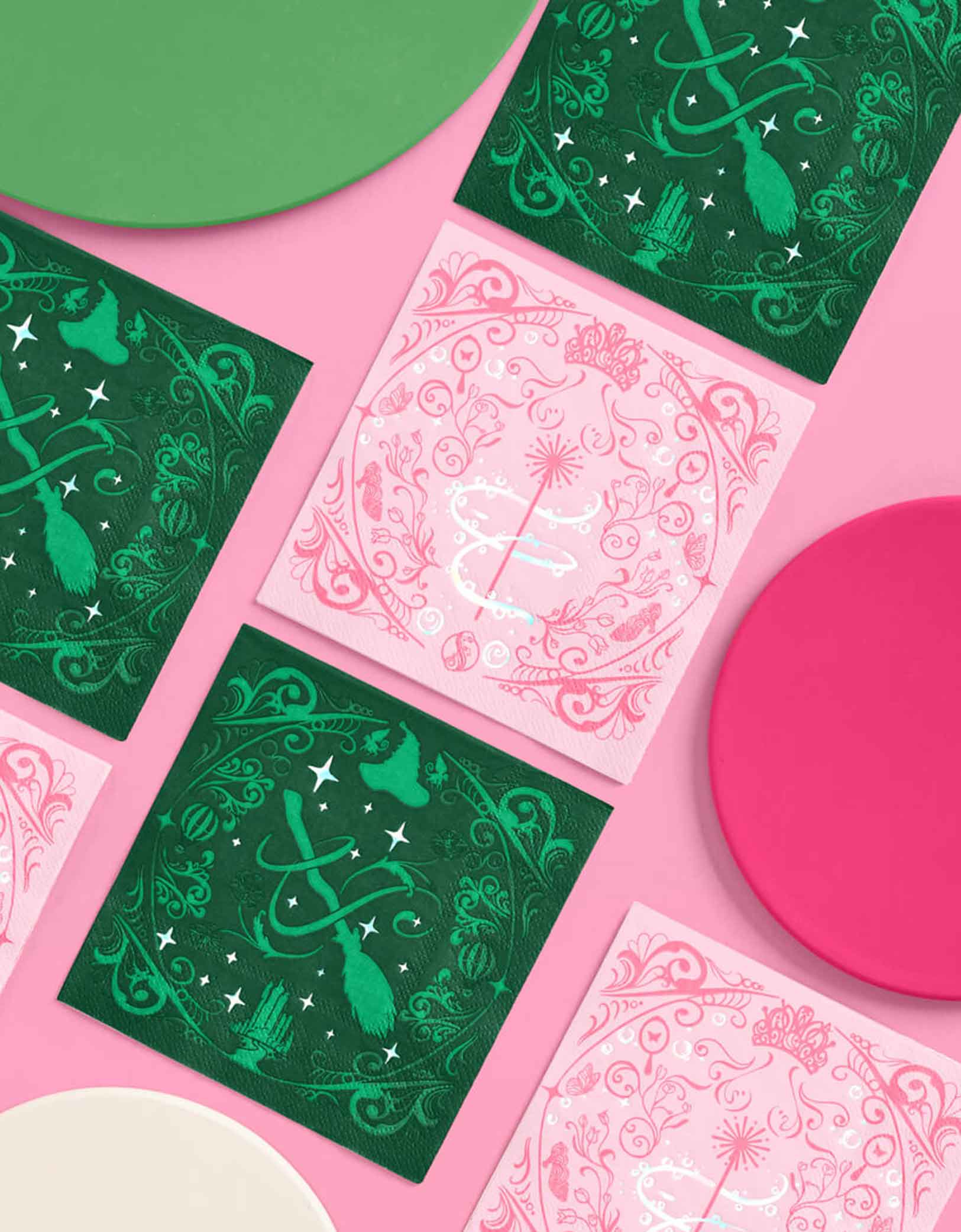 Momo Party's 5" Wicked Party paper napkins by Xo Fetti in pink and green designs on a two-tone background. 