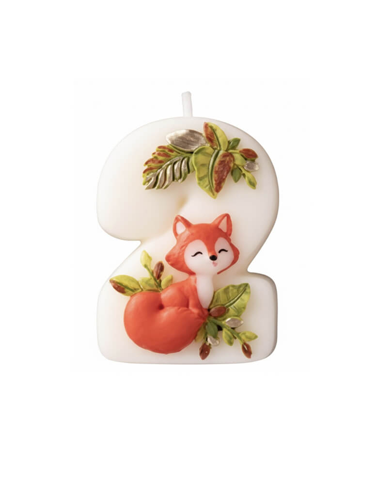 An adorable woodland themed kid's number two birthday candle a cute fox design and some foliage from Momo Party on a white background. Perfect for kid's woodland second birthday party celebration.