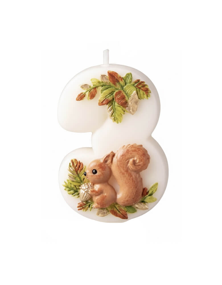An adorable woodland themed kid's number three birthday candle a cute squirrel design and some foliage from Momo Party on a white background. Perfect for kid's woodland third birthday party celebration.