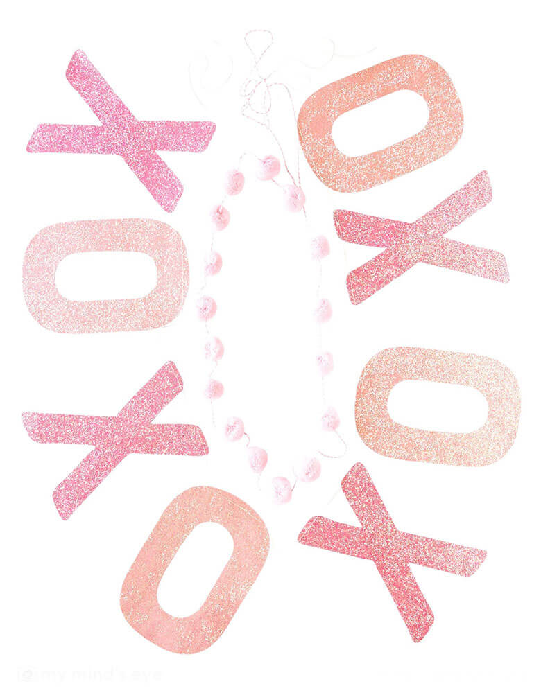 Momo Party's 5ft XOXO Glitter Banner Set by My Mind's Eye. This set includes two banners: a festive pink pom pom banner and a glittery XOXO banner. This banner set will light up your space with love and excitement!