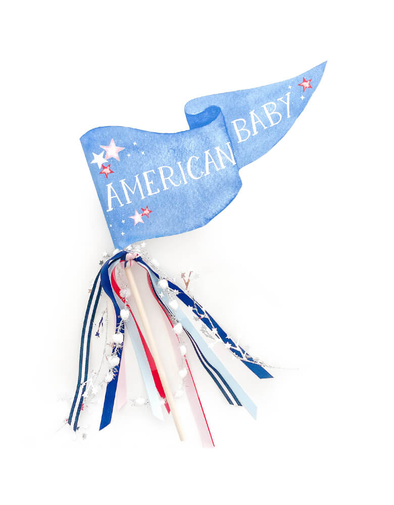 Cami Monet - American Baby Party Pennant. This Handmade pennant made in United States of America, in Size: 10 x 5 inches. This is made of 120 lb. luxe watercolor texture paper with handwriting "American Baby" text in watercolor illustration for extra whimsy. With red and blue with white stripe and mixed Ribbon and sparkle garland. This adorable party pennant is a perfect for a 4th of july celebration!