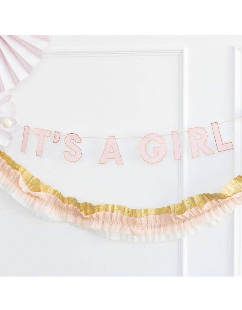 My Mind's Eye Baby Pink Banner hung on the wall in a baby girl shower