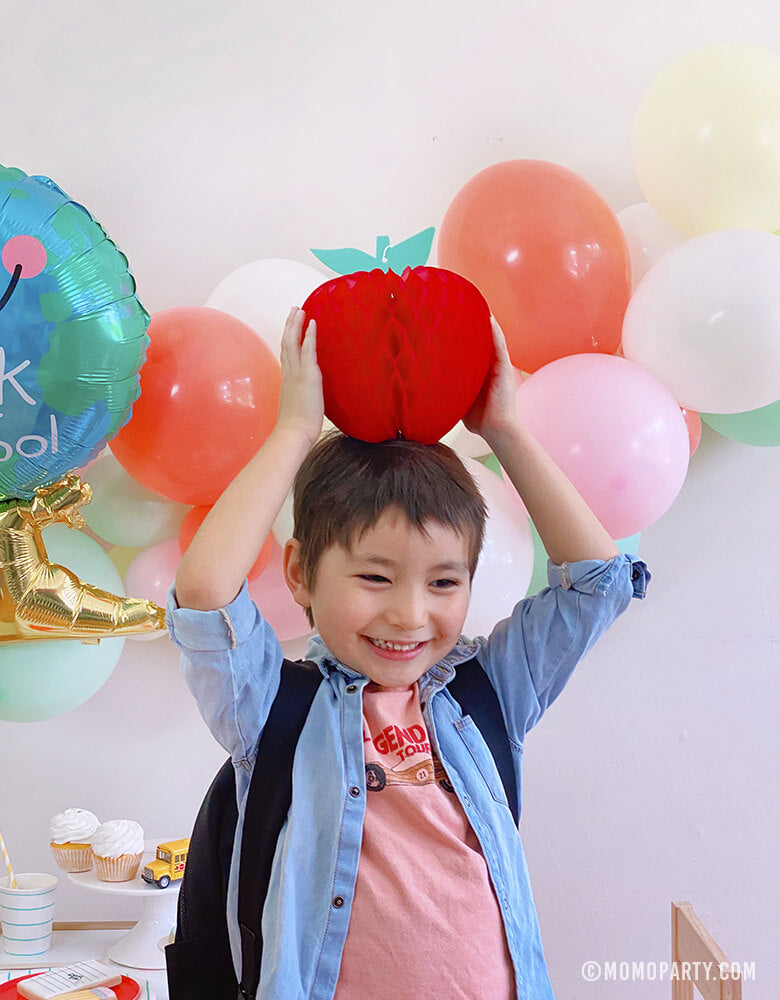 Child playing with Devra Party 7" Honeycomb Apple at Back to school Home party 