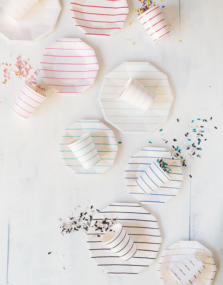 Daydream Society Frenchie Stripes Collection with party cups, plates, and napkin in different colors spread out