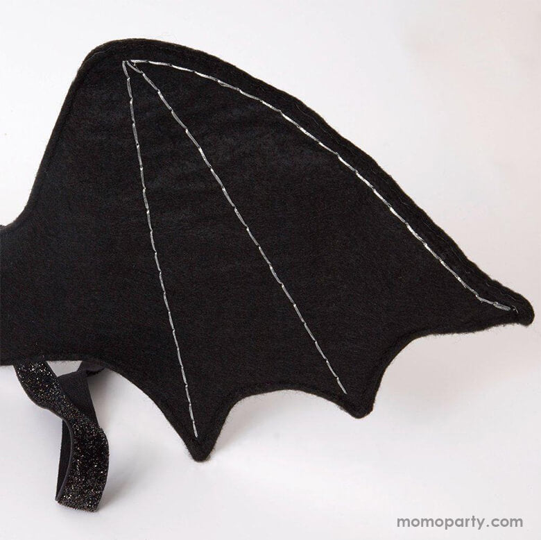 Close up details of Meri Meri - Bat Wings Costume. This fabulous bat dress-up kit, featuring black felt bat wings, is spook-tacular for little ones to glide around in this Halloween