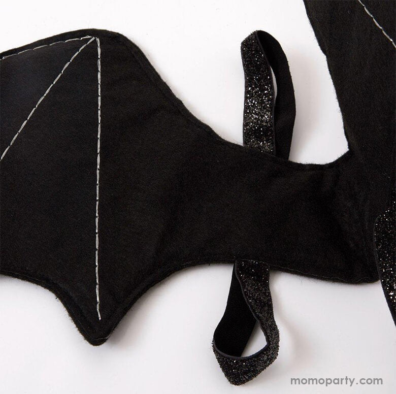 Black felt bat wings Close up details of Meri Meri - Bat Wings Costume with black glitter strap, is spook-tacular for little ones to glide around in this Halloween