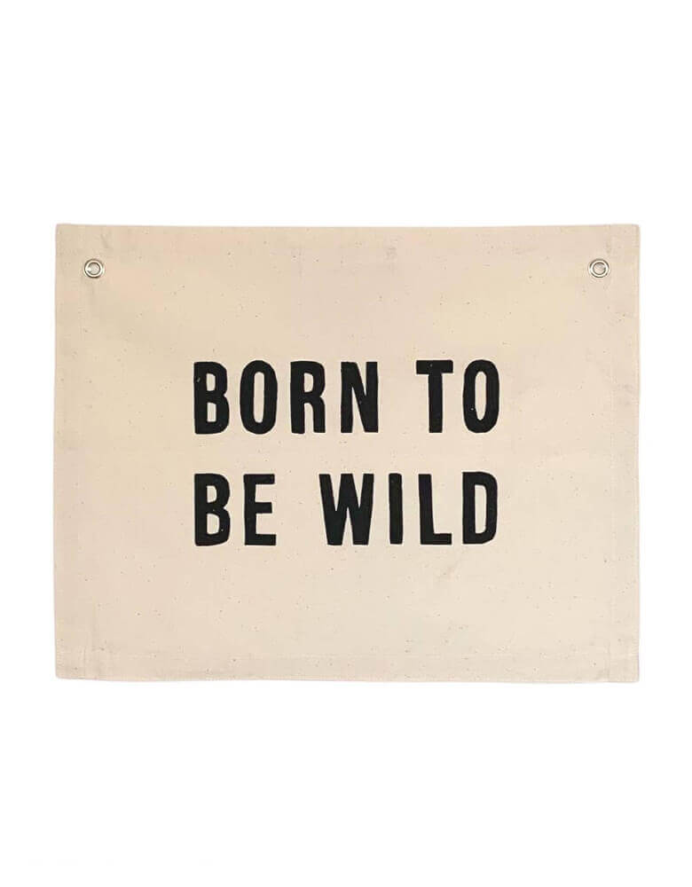 Imani Collective Born-To-Be-Wild-Banner. size 16 x 20 inches with 1/2 inch grommets. This modern hanging banner was sewn and screen printed by hand on natural canvas by local artisans in Kenya. It's a perfect decoration for your entrance hall, Nursery Decor, or your little wild one's playroom! Sold by Momo party store provided modern party supplies, boutique party supplies, chic holiday party supplies and high end party supplies