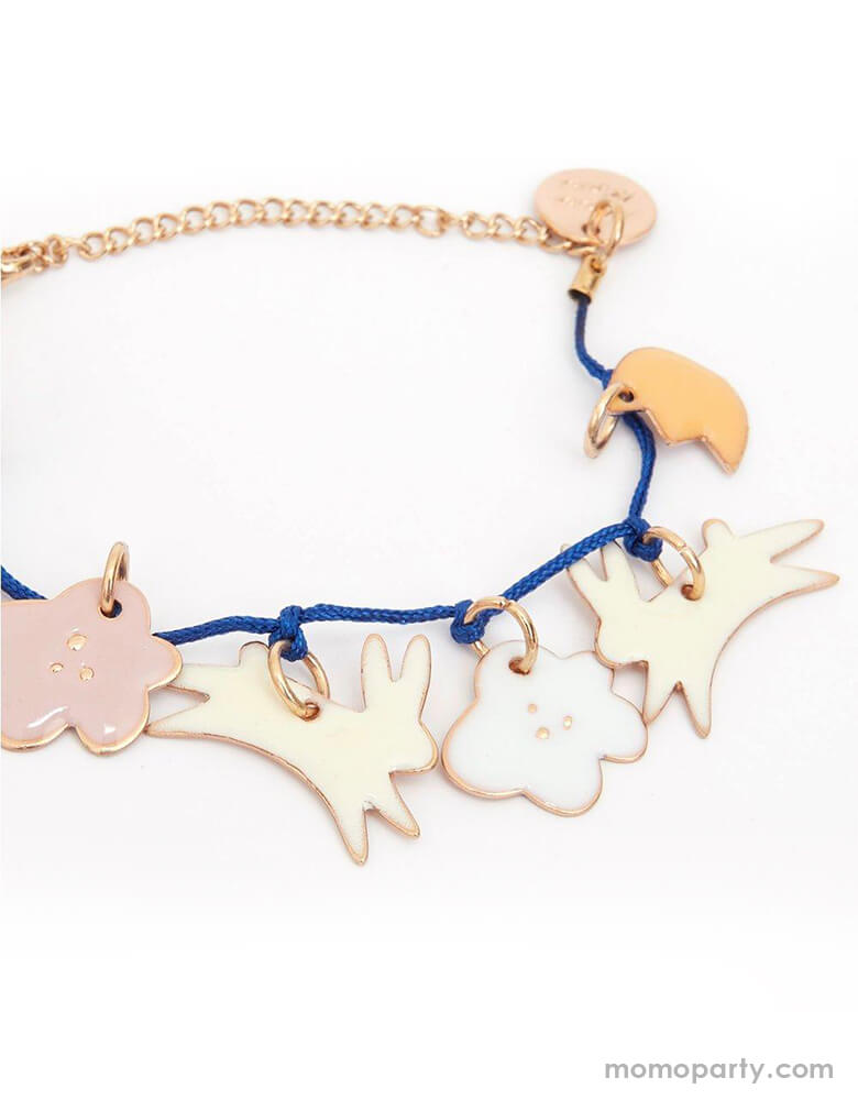 Meri Meri Bunny Enamel Bracelet. Featuring 7 enamel charms with adorable enamel bunnies and flowers. Embellished with gold foil details and has a bold blue cord and gold tone chain and fastener. so cute for your non-chocolate gift for Easter