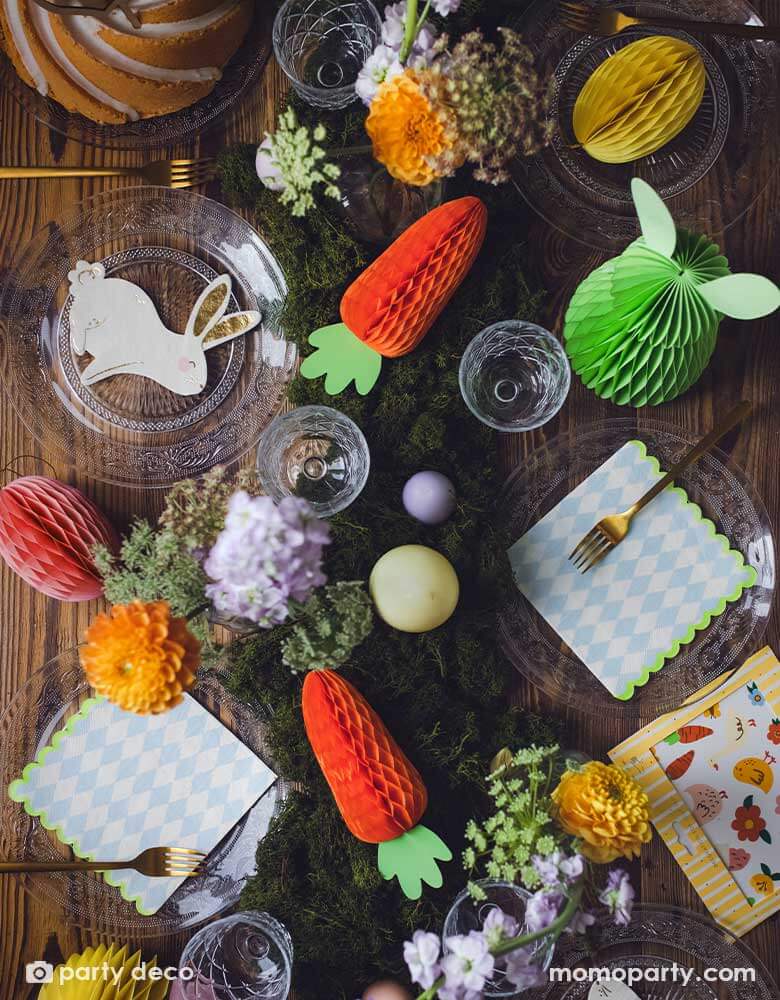 A beautiful rustic Easter table decorated with lots of spring flowers and honeycomb carrot and Easter egg decorations as centerpiece, with Momo Party's 5 x 6.3" bunny napkins by Party Deco, it makes a great inspiration for an adorable kid's Easter tableset.
