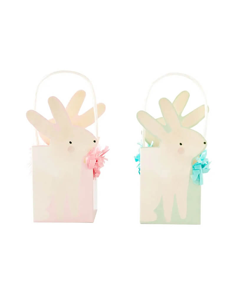 Momo Party's 3" X 3" X 7" bunny treat boxes by My Mind's Eye. Come in a set of 8 mini baskets in two colors of pink and aqua, featuring fringe edges, they also make wonderful mini baskets for your kids this Easter.