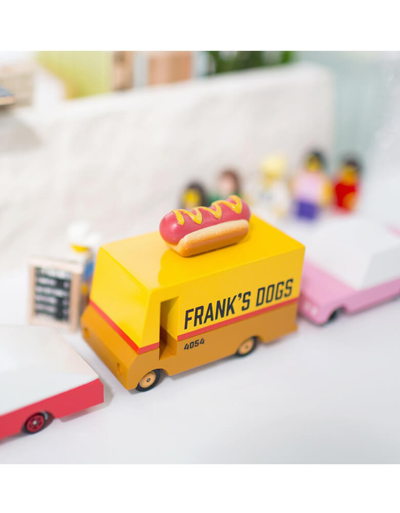 Candylab Wooden Car toy - Candyvan  Hot Dog Van Parking on the street with lots of lego figures waiting in line for hotdog