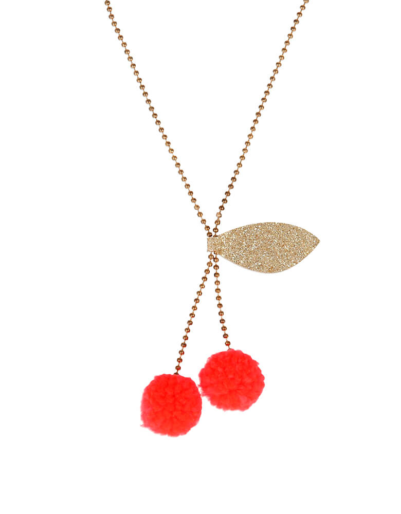 Meri Meri Cherry Pom Pom Necklace. Featuring Yarn pompoms with gold glitter fabric on a Gold enamel bead chain. This beautifully crafted cherry pompom necklace is simply charming. Perfect as a gift for someone who loves quirky accessories.