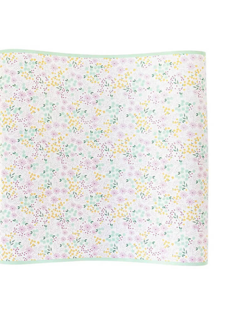 Momo Party's 16 x 120 inches Ditsy Floral table runner by My Mind's Eye. In a beautiful floral design, it's perfect for a spring themed party or an Easter celebration.
